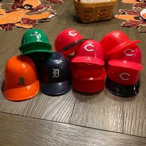 11 MLB mini helmets.